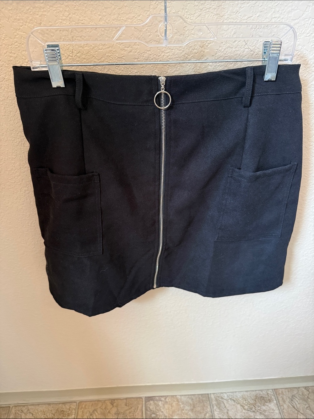 Black Front-Zip Mini Skirt with Patch Pockets